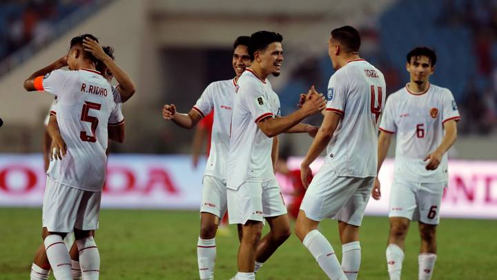 Indonesia players celebrate the team's 3-0 victory in the FIFA World Cup Asian second qualifier Group F match between Vietnam and Indonesia at My Dinh National Stadium on March 26, 2024 in Hanoi, Vietnam.