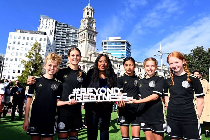 FIFA Secretary General Fatma Samoura poses with young football players in Auckland