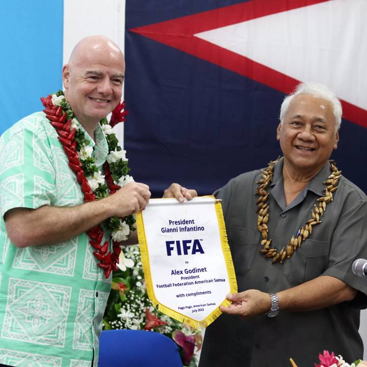 PAGO PAGO, AMERICAN SAMOA - JULY 28: FIFA President Gianni Infantino and  Football Federation American Samoa President Iuli Alex Godinet pose with with pennant at FFAS HQ as part of a visit to American Samoa during the FIFA Women's World Cup Australia & New Zealand 2023 on July 28, 2023 in Pago Pago, American Samoa. (Photo by Elysha Samatua)