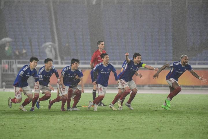 Yokohama players celebrate