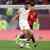 AL WAKRAH, QATAR - DECEMBER 11: Ali Olwan of Jordan dribbles downfield against Mahmoud Hamdy of Egypt during the FIFA Arab Cup Qatar 2021 Quarter-Final match between Egypt and Jordan at Al Janoub Stadium on December 11, 2021 in Al Wakrah, Qatar. (Photo by Maddie Meyer - FIFA/FIFA via Getty Images)