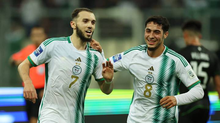 ALGIERS, ALGERIA - MARCH 22: Amine Ferid Ghouiri of Algeria (L) celebrates with teammate Fares Chaibi after scoring their team's first goal during the FIFA Series 2024 Algeria match between Algeria and Bolivia at Nelson Mandela Stadium on March 22, 2024 in Algiers, Algeria. (Photo by Richard Pelham - FIFA/FIFA via Getty Images)