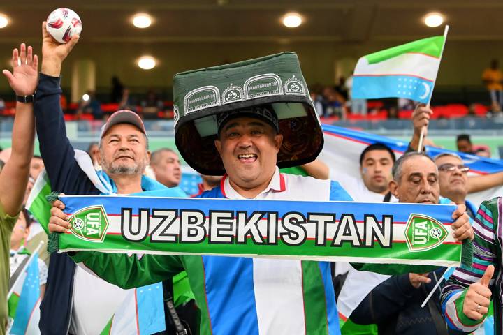 Fans of Uzbekistan show their support