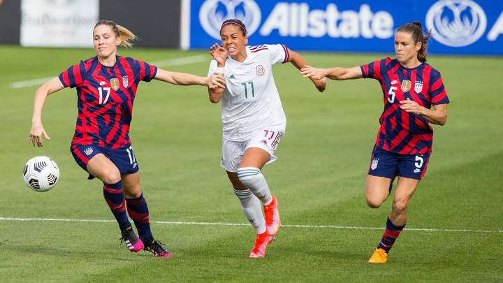 EAST HARTFORD, CT - JULY 05: United States defender Abby Dahlkemper (17) and United States defender Kelley O'Hara (5) defend Mexico midfielder Maria Sanchez (11) during an international friendly match between Mexico and United States on July 5 , 2021 at Pratt & Whitney Stadium at Rentschler Field in East Hartford, CT. (Photo by M. Anthony Nesmith/Icon Sportswire via Getty Images)