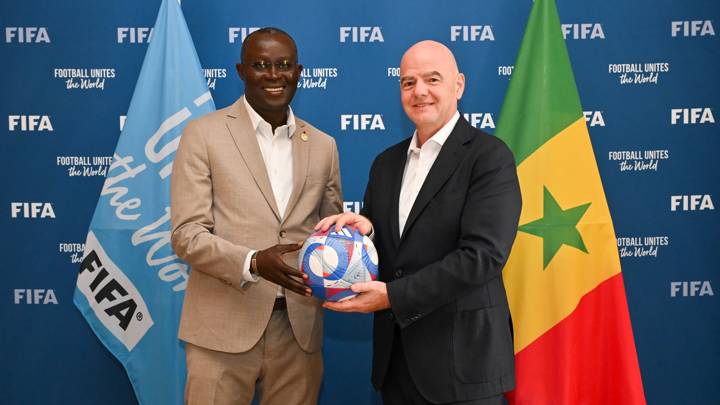 PARIS, FRANCE - AUGUST 07: FIFA President Gianni Infantino and the Senegalese Football Federation President Augustin Senghor pose for a photo with Olympic Games Paris 2024 official match ball during a meeting between FIFA and the Senegalese Football Federation President at FIFA's Paris office on August 07, 2024 in Paris, France. (Photo by Harold Cunningham/FIFA)