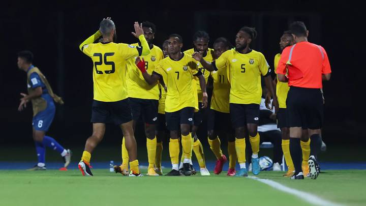 JEDDAH, SAUDI ARABIA - MARCH 26: Bong Kalo of Vanuatu (obscured) celebrates scoring his team's first goal with teammates during the FIFA Series 2024 Saudi Arabia match between Vanuatu and Brunei Darussalam at King Abdullah Sports City on March 26, 2024 in Jeddah, Saudi Arabia. (Photo by Yasser Bakhsh - FIFA/FIFA via Getty Images)