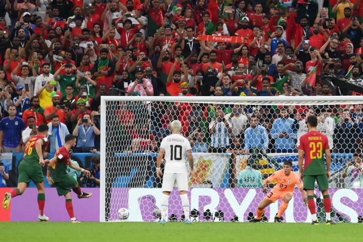 Bruno Fernandes of Portugal scores their team's second goal off a penalty