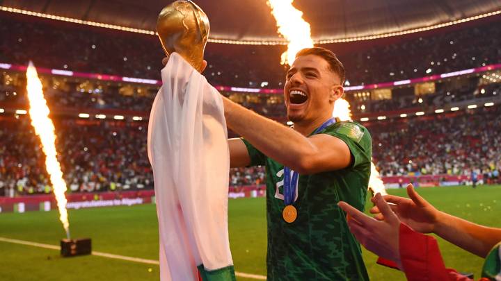 AL KHOR, QATAR - DECEMBER 18: Ilyes Cheti of Algeria celebrates with the FIFA Arab Cup trophy following victory during the FIFA Arab Cup Qatar 2021 Final match between Tunisia and Algeria at Al Bayt Stadium on December 18, 2021 in Al Khor, Qatar. (Photo by David Ramos - FIFA/FIFA via Getty Images)