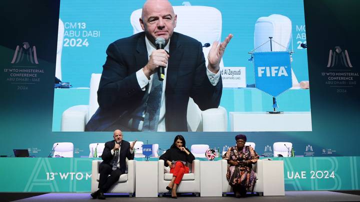 ABU DHABI, UNITED ARAB EMIRATES - FEBRUARY 24: FIFA President Gianni Infantino, CNN Anchor Eleni Giokos and WTO Director-General Ngozi Okonjo-Iweala during the FIFA and WTO High Level MC13 Side-Event on Cotton on February 24, 2024 in Abu Dhabi, United Arab Emirates. (Photo by Chris Pike - FIFA/FIFA via Getty Images)