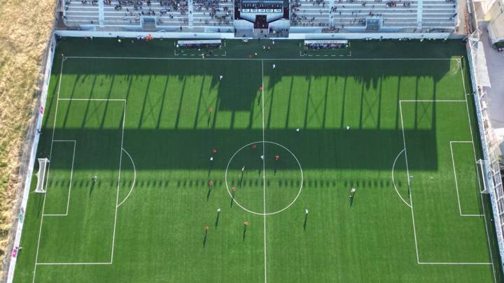 An aerial picture shows a football match between Jordan and Palestine during the inauguration of the newly-renamed Pele Stadium in al-Khader village in Bethlehem, on May 14, 2023. (Photo by HAZEM BADER / AFP) (Photo by HAZEM BADER/AFP via Getty Images)