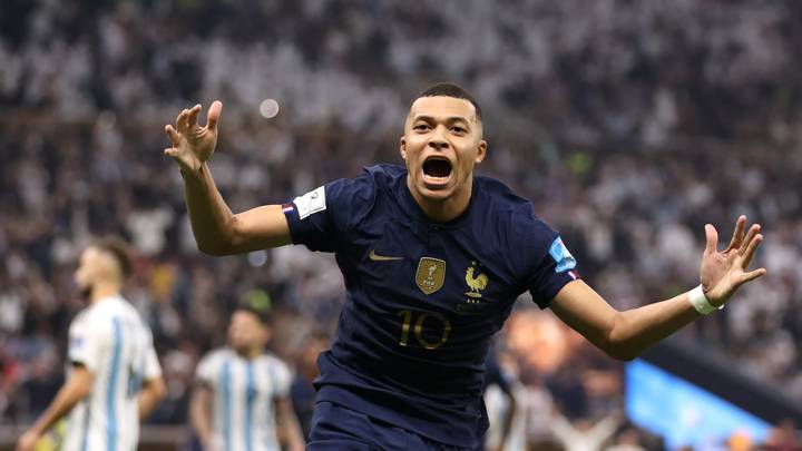 LUSAIL CITY, QATAR - DECEMBER 18: Kylian Mbappe of France celebrates after scoring the team's second goal during the FIFA World Cup Qatar 2022 Final match between Argentina and France at Lusail Stadium on December 18, 2022 in Lusail City, Qatar. (Photo by Catherine Ivill/Getty Images)