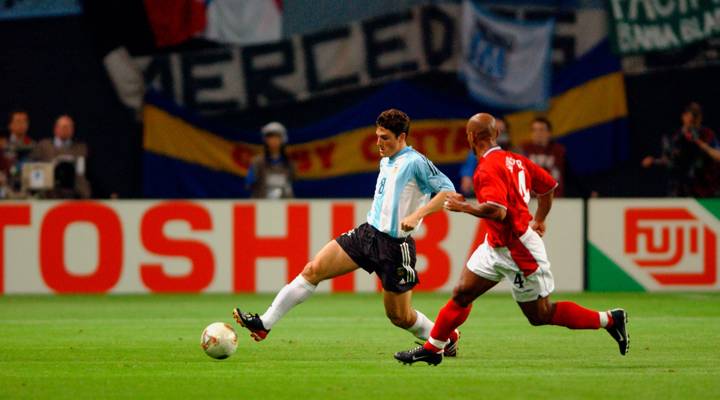 Argentina's Javier Zanetti is challenged by England's Trevor Sinclair