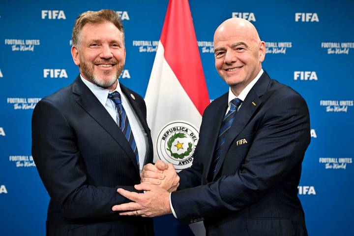 FIFA President Gianni Infantino and FIFA Vice-President and CONMEBOL President Alejandro Dominguez pose for a photo