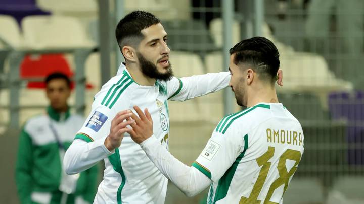 ALGIERS, ALGERIA - MARCH 26: Yassine Benzia of Algeria celebrates with Mohamed Amoura of Algeria after scoring his team's first goal during the FIFA Series 2024 Algeria match between Algeria and South Africa at Nelson Mandela Stadium on March 26, 2024 in Algiers, Algeria. (Photo by Richard Pelham - FIFA/FIFA via Getty Images)