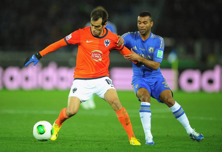 Monterrey’s Cesar Delgado holds of Chelsea’s Ashley Cole during the Japan 2012 semi-finals