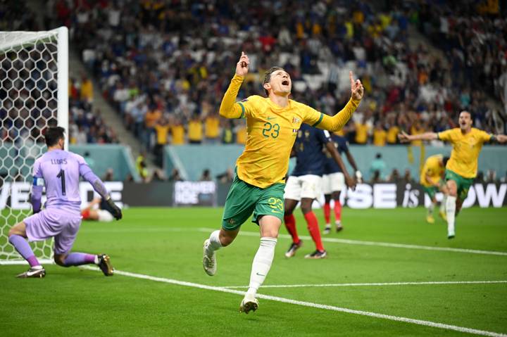 AL WAKRAH, QATAR - NOVEMBER 22: Craig Goodwin of Australia celebrates scoring his side's first goal during the FIFA World Cup Qatar 2022 Group D match between France and Australia at Al Janoub Stadium on November 22, 2022 in Al Wakrah, Qatar. (Photo by Clive Mason/Getty Images)