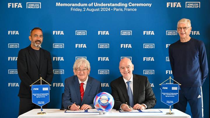 PARIS, FRANCE - AUGUST 02: (L-R) FIFA Senior Football Advisor Youri Djorkaeff, President and Founder of the Homeless World Cup Mel Young, FIFA President Gianni Infantino and FIFA Chief of Global Football Development Arsène Wenger during Signing of the Memorandum of Understanding (MoU) between FIFA and Homeless World Cup Foundation ceremony at FIFA's Paris office on August 02, 2024 in Paris, France. (Photo by Harold Cunningham/FIFA)