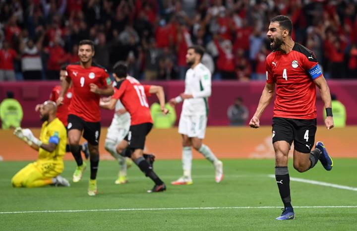 Amro Elsoulia of Egypt celebrates after scoring their team's first goal during the FIFA Arab Cup Qatar 2021 Group D match between Algeria and Egypt