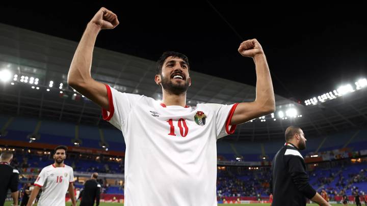 DOHA, QATAR - DECEMBER 07: Yazan Alnaimat of Jordan celebrates following victory during the FIFA Arab Cup Qatar 2021 Group C match between Jordan and Palestine at Stadium 974 on December 07, 2021 in Doha, Qatar. (Photo by Francois Nel - FIFA/FIFA via Getty Images)