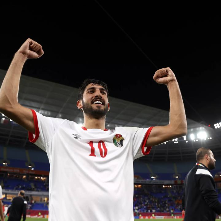 DOHA, QATAR - DECEMBER 07: Yazan Alnaimat of Jordan celebrates following victory during the FIFA Arab Cup Qatar 2021 Group C match between Jordan and Palestine at Stadium 974 on December 07, 2021 in Doha, Qatar. (Photo by Francois Nel - FIFA/FIFA via Getty Images)