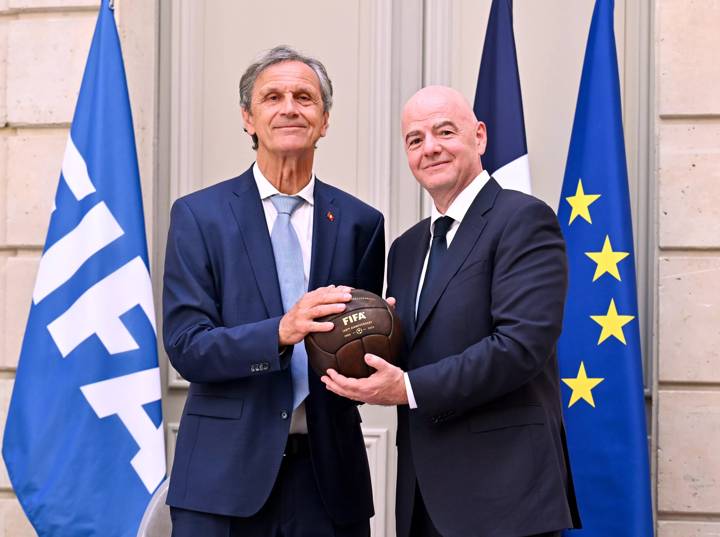 FIFA President Gianni Infantino poses for a photo with Swiss Football Association President Dominique Blanc 