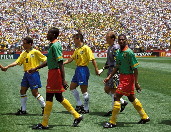 Cameroon's Rigobert Song walks out against Brazil at USA 1994