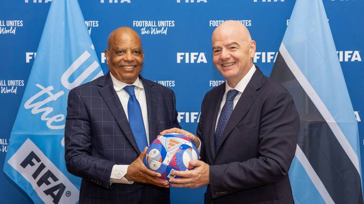 PARIS, FRANCE - JULY 29: FIFA President Gianni Infantino and Botswana Football Association (BFA) President Maclean Letshwiti pose for a photo with an Olympic Games Paris 2024 official match ball after a meeting between FIFA and BFA at FIFA's Paris office on July 29, 2024 in Paris, France. (Photo by Léo-Paul Ridet/FIFA)