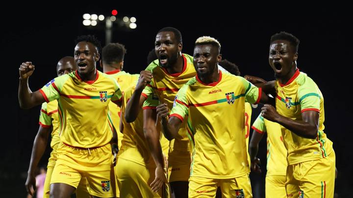 JEDDAH, SAUDI ARABIA - MARCH 25: Morlaye Sylla of Guinea celebrates with teammates after scoring his team's first goal during the FIFA Series 2024 Saudi Arabia match between Guinea and Bermuda at King Abdullah Sports City on March 25, 2024 in Jeddah, Saudi Arabia. (Photo by Yasser Bakhsh - FIFA/FIFA via Getty Images)