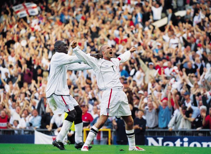 David Beckham of England celebrates his injury time equalising goal.