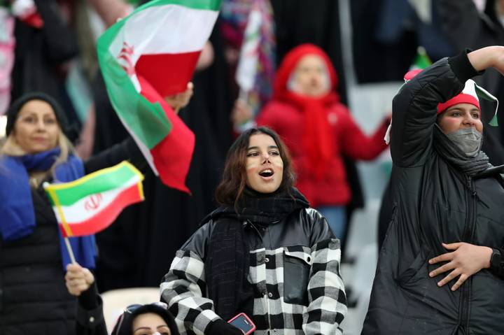 TEHRAN, IRAN - JANUARY 27: Iranian fans react during FIFA World Cup Qualifier match between Iran v Iraq at Azadi Stadium on January 27, 2022 in Tehran, Iran. (Photo by Amin Mohammad Jamali/Getty Images)