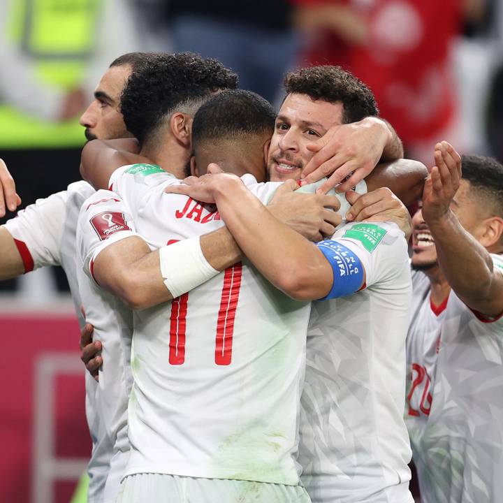 AL RAYYAN, QATAR - DECEMBER 10: Youssef Msakni of Tunisia celebrates with teammates after scoring their team's second goal during the FIFA Arab Cup Qatar 2021 Quarter-Final match between Tunisia and Oman at Education City Stadium on December 10, 2021 in Doha, Qatar. (Photo by Maddie Meyer - FIFA/FIFA via Getty Images)