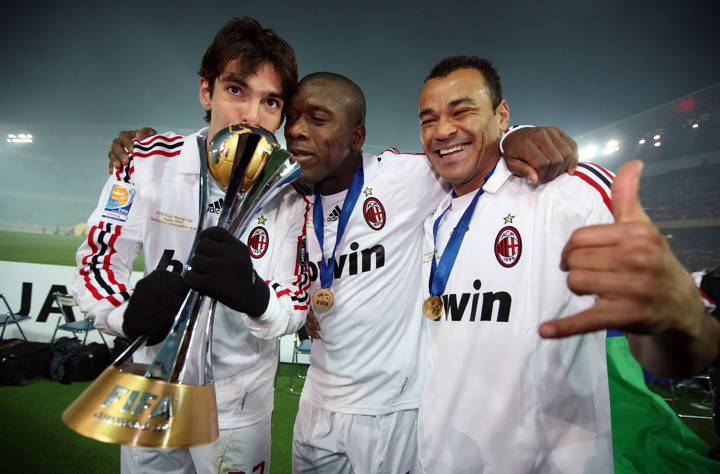 AC Milan's Kaka, Clarence Seedorf and Cafu celebrate winning the FIFA Club World Cup 2007