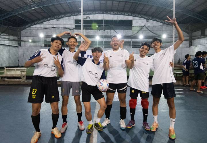 A team of male youths line-up before an Exhibition Futsal Community held by the FIFA Foundation at Sampoerna Sports Club In Bandung, West Java, Indonesia